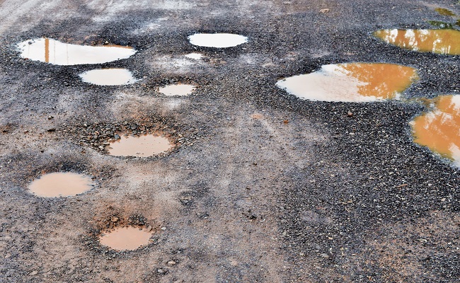 Signs That Your Asphalt Driveway May Need to be Repaired or Replaced